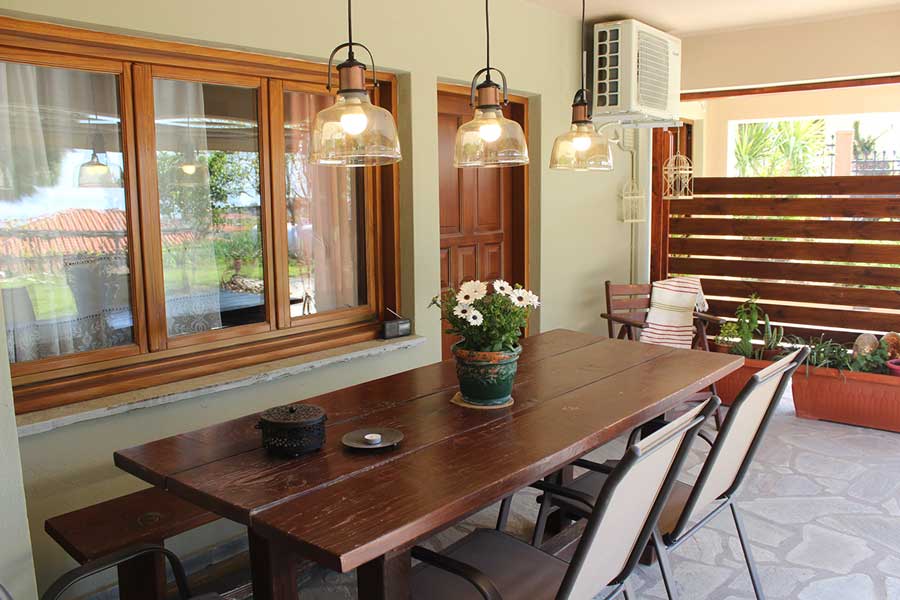 Wooden table in front of the pinehouse standard